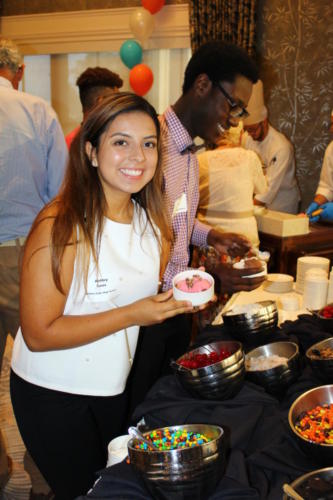 Ashley Leos graduate of Golden Gate High School enjoying the ice cream social 